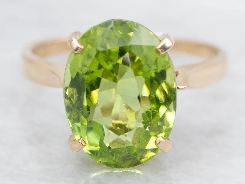 Sapphire Gemstone Rings in a Victorian - Inspired DesignSapphire Gemstone Rings in a Victorian - Inspired DesignPeridot Solitaire Ring in Four-Prong Setting