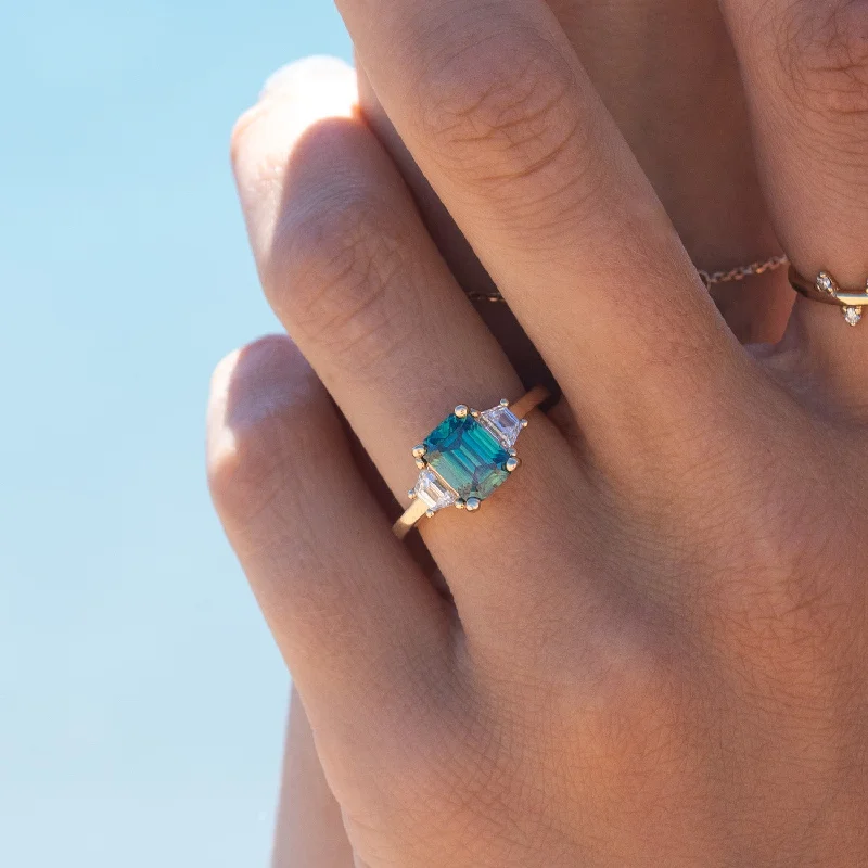 Aquamarine Gemstone Rings with a Nautical - Themed SettingAquamarine Gemstone Rings with a Nautical - Themed SettingThe Evelyn Ring | 2.50ct Emerald Cut Green Moissanite & Trapezoid Lab Diamond Trilogy