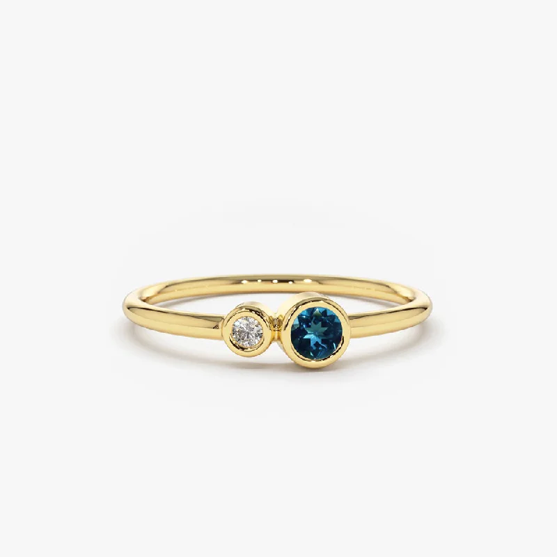 Opal Gemstone Rings with a Rainbow - Hued Play of ColorOpal Gemstone Rings with a Rainbow - Hued Play of Color14K Gold Bezel Setting London Blue Topaz and Diamond Ring