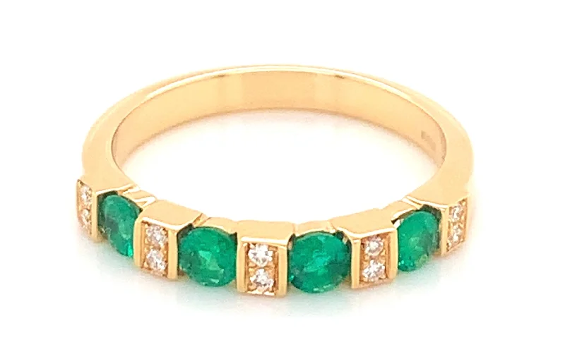 Topaz Gemstone Rings with a Faceted Cut and Shimmering EffectTopaz Gemstone Rings with a Faceted Cut and Shimmering Effect18ct Yellow Gold 0.45ct Emerald And 0.08ct Diamond Eternity Ring