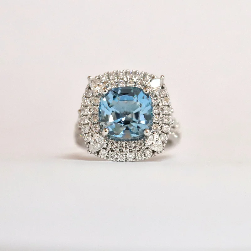 Emerald Gemstone Rings with Diamond - Encrusted HalosEmerald Gemstone Rings with Diamond - Encrusted Halos18ct White Gold Cushion Cut Blue Aquamarine Ring with Double Diamond Halo