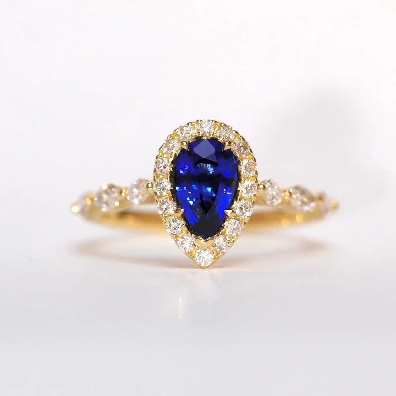 Sapphire Gemstone Rings in a Victorian - Inspired DesignSapphire Gemstone Rings in a Victorian - Inspired Design18ct Yellow Gold Pear Cut Blue Sapphire Ring with Diamond Halo