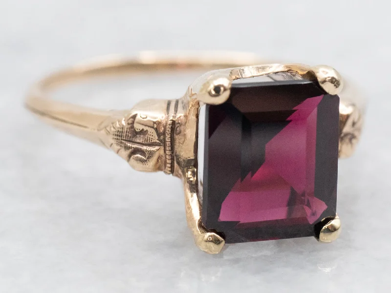 Topaz Gemstone Rings with a Faceted Cut and Shimmering EffectTopaz Gemstone Rings with a Faceted Cut and Shimmering EffectAntique Rhodolite Garnet Solitaire Ring