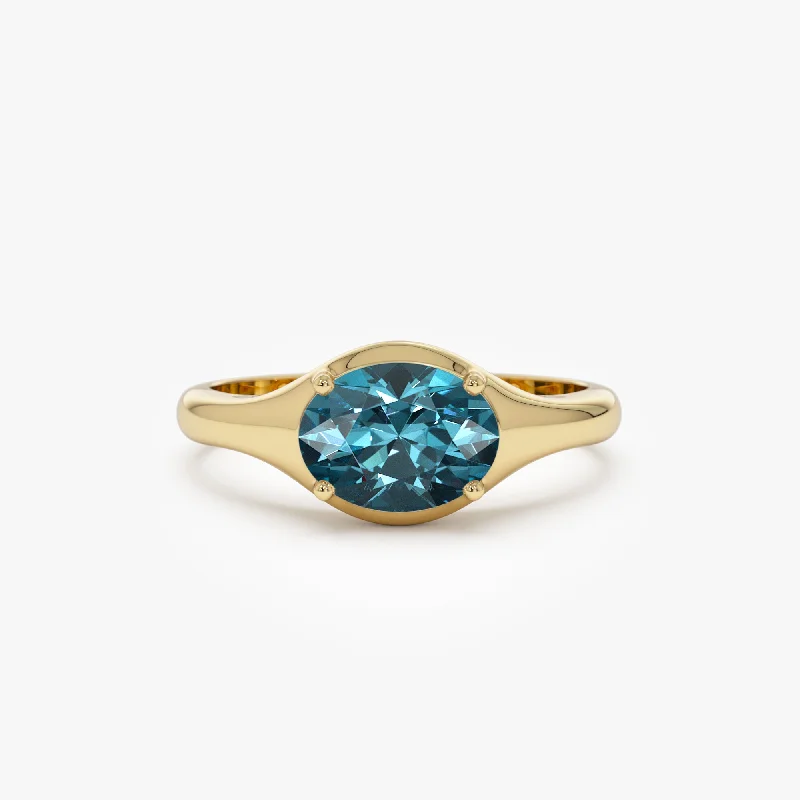 Jade Gemstone Rings with Intricate CarvingsJade Gemstone Rings with Intricate Carvings14K Oval Shape Prong Setting London Blue Topaz Ring