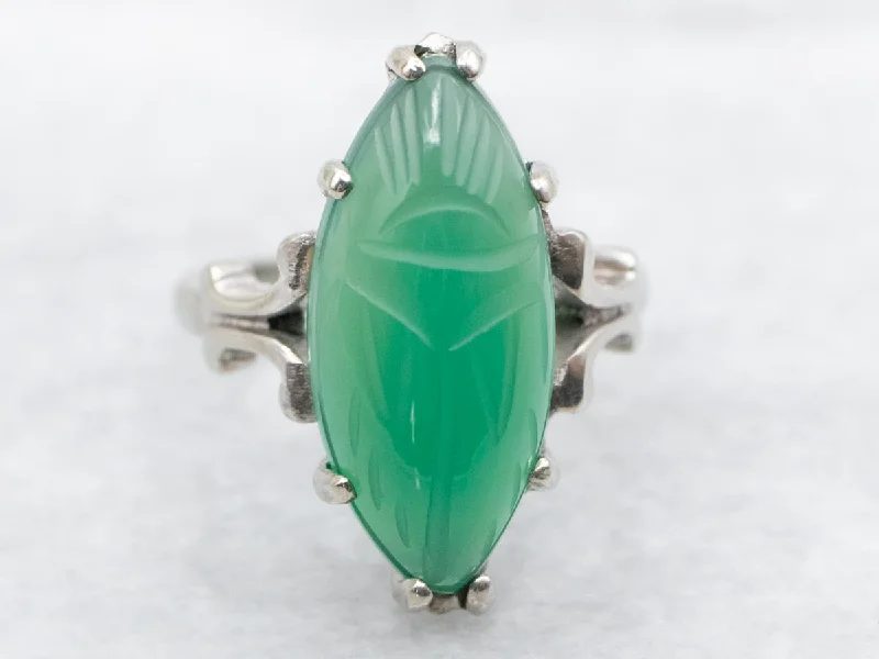 Topaz Gemstone Rings with a Faceted Cut and Shimmering EffectTopaz Gemstone Rings with a Faceted Cut and Shimmering EffectCarved Green Onyx Scarab Beetle Ring