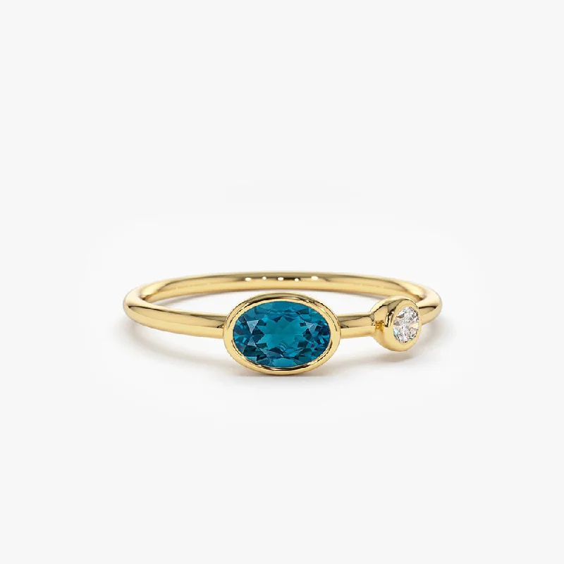 Lapis Lazuli Gemstone Rings with Gold - Leaf InclusionsLapis Lazuli Gemstone Rings with Gold - Leaf Inclusions14k Gold Oval London Blue Topaz  and Diamond Ring