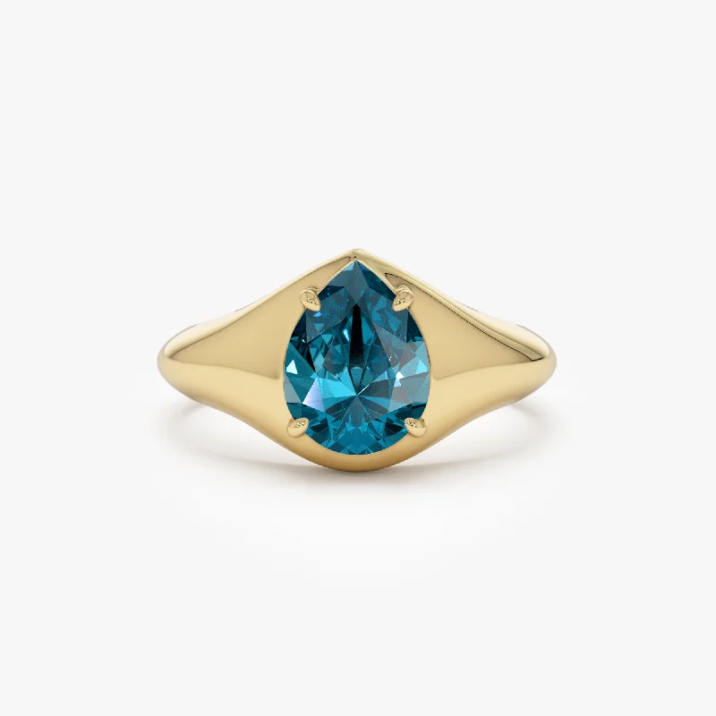 Alexandrite Gemstone Rings with a Chameleon - like Color ChangeAlexandrite Gemstone Rings with a Chameleon - like Color Change14K Pear Shaped London Blue Topaz Statement Ring