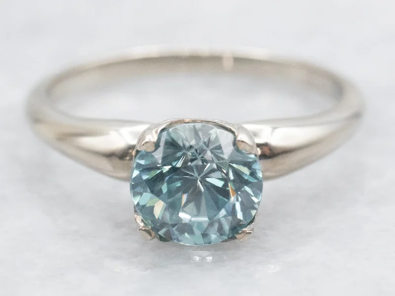 Emerald Gemstone Rings with Diamond - Encrusted HalosEmerald Gemstone Rings with Diamond - Encrusted HalosBlue Zircon Solitaire Ring