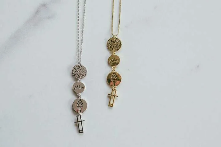 Zodiac - Sign Pendant Necklaces with Personalized Birthstone SettingsZodiac - Sign Pendant Necklaces with Personalized Birthstone SettingsLindi Kingi Peace Drop Necklace - Gold Plate