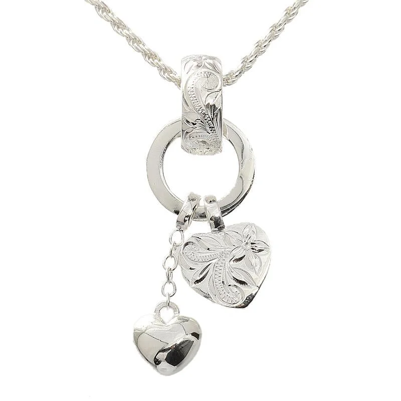 Medallion - Pendant Necklaces with Intricate Relief - Style ArtworkMedallion - Pendant Necklaces with Intricate Relief - Style ArtworkSterling Silver Hawaiian Scroll Two Heart Ring Pendant (Chain Sold Separately)